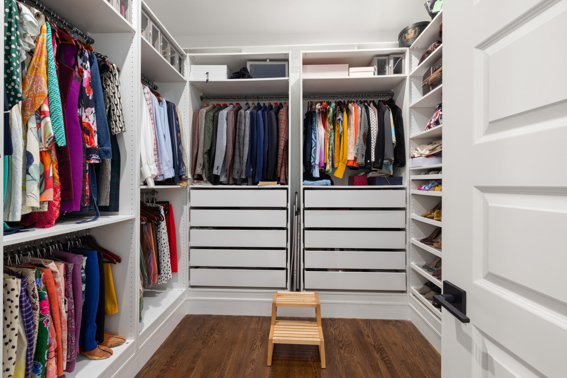 Walk-in closet organized by Maid Bees